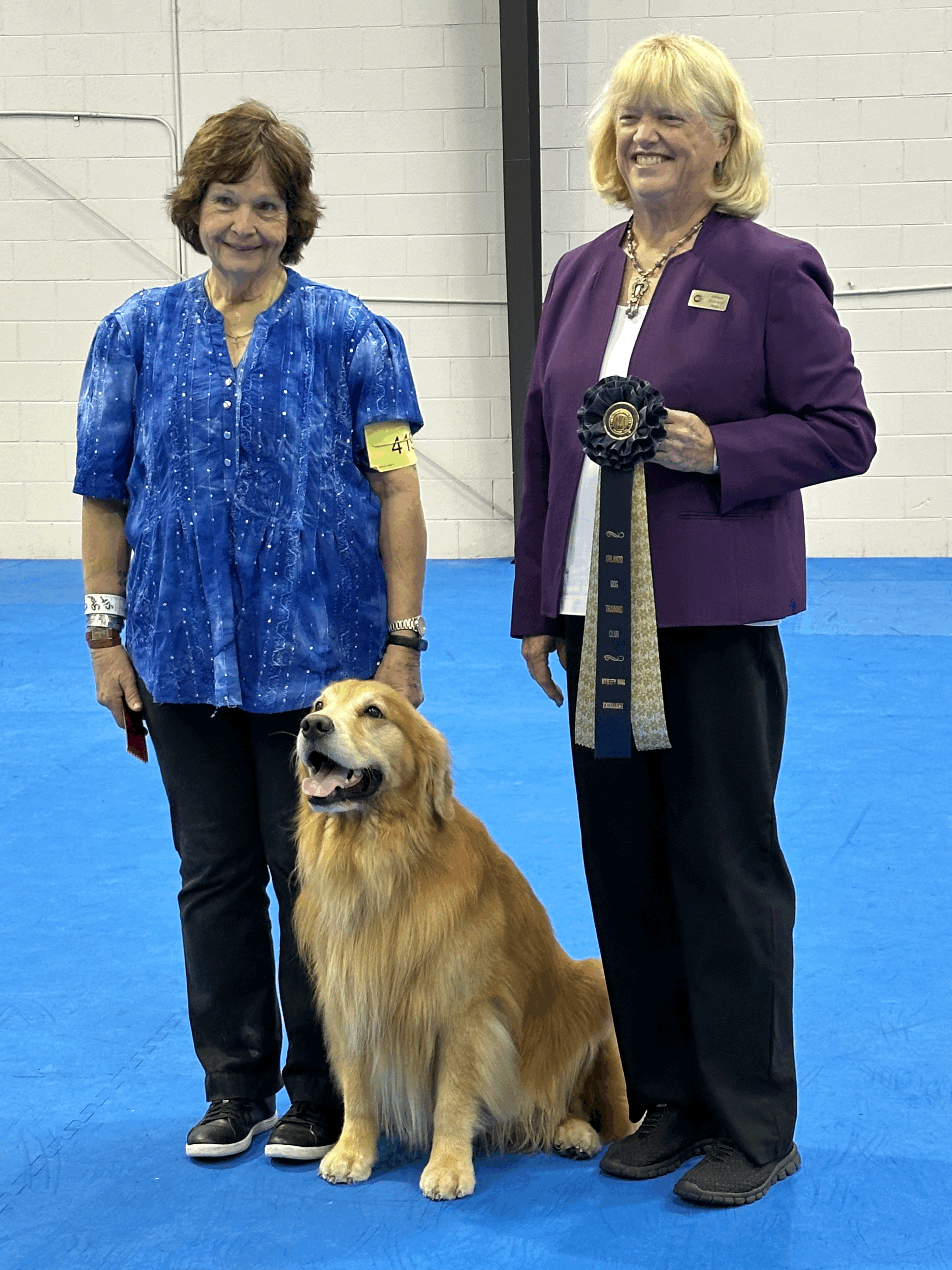 golden receiving ribbon from judge